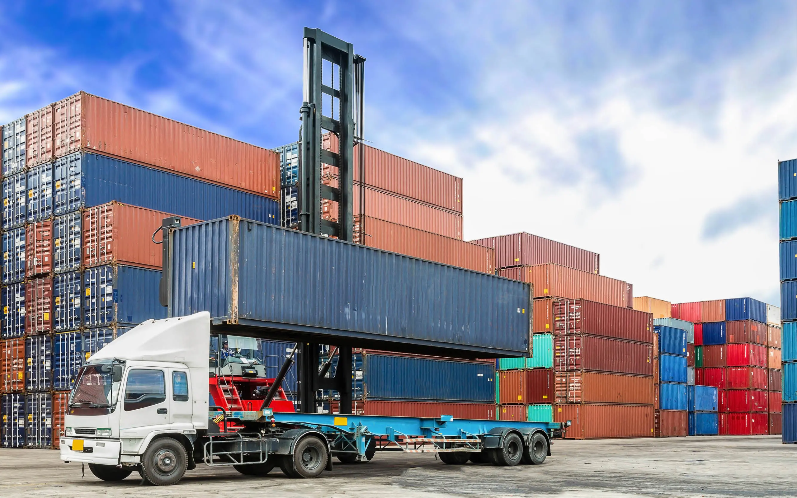 large shipping truck with cargo and freight containers