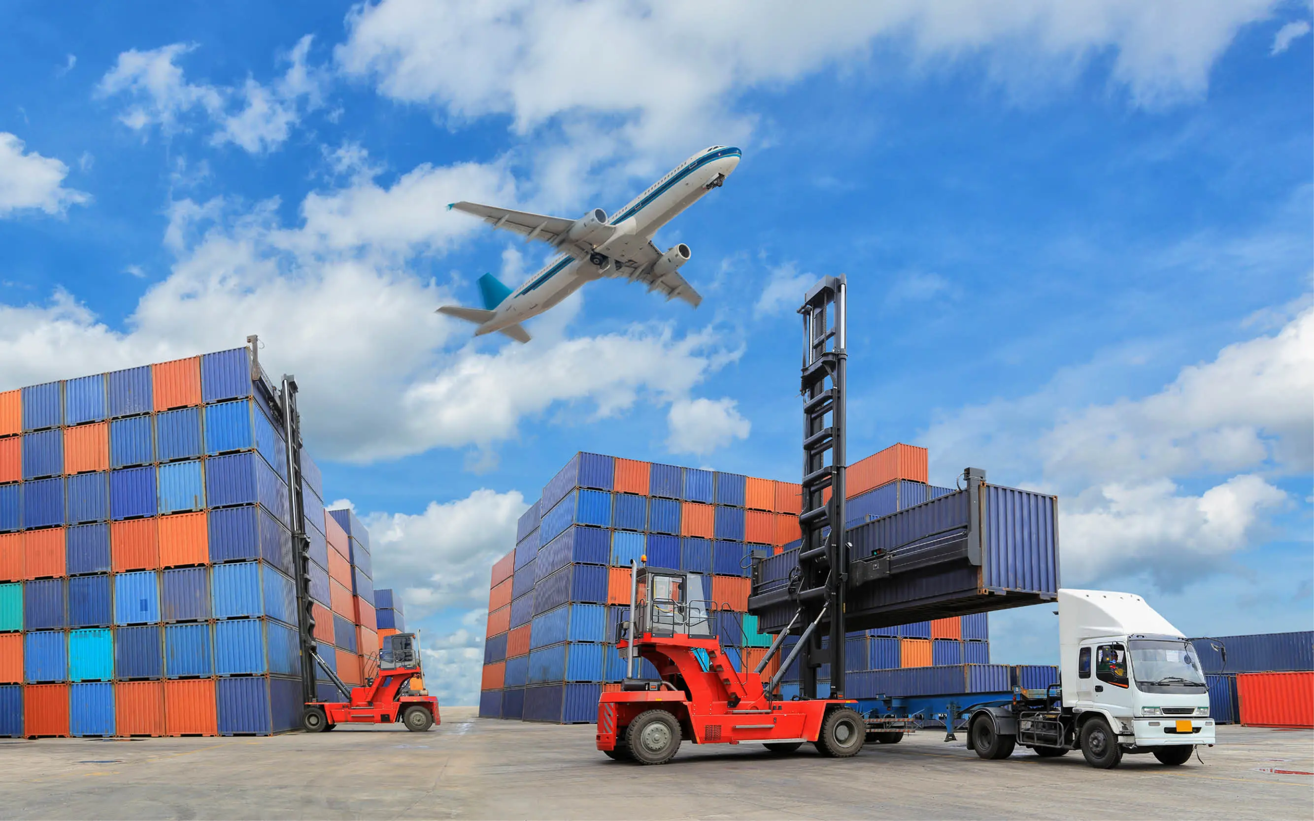 shipping truck, plane, and cargo containers