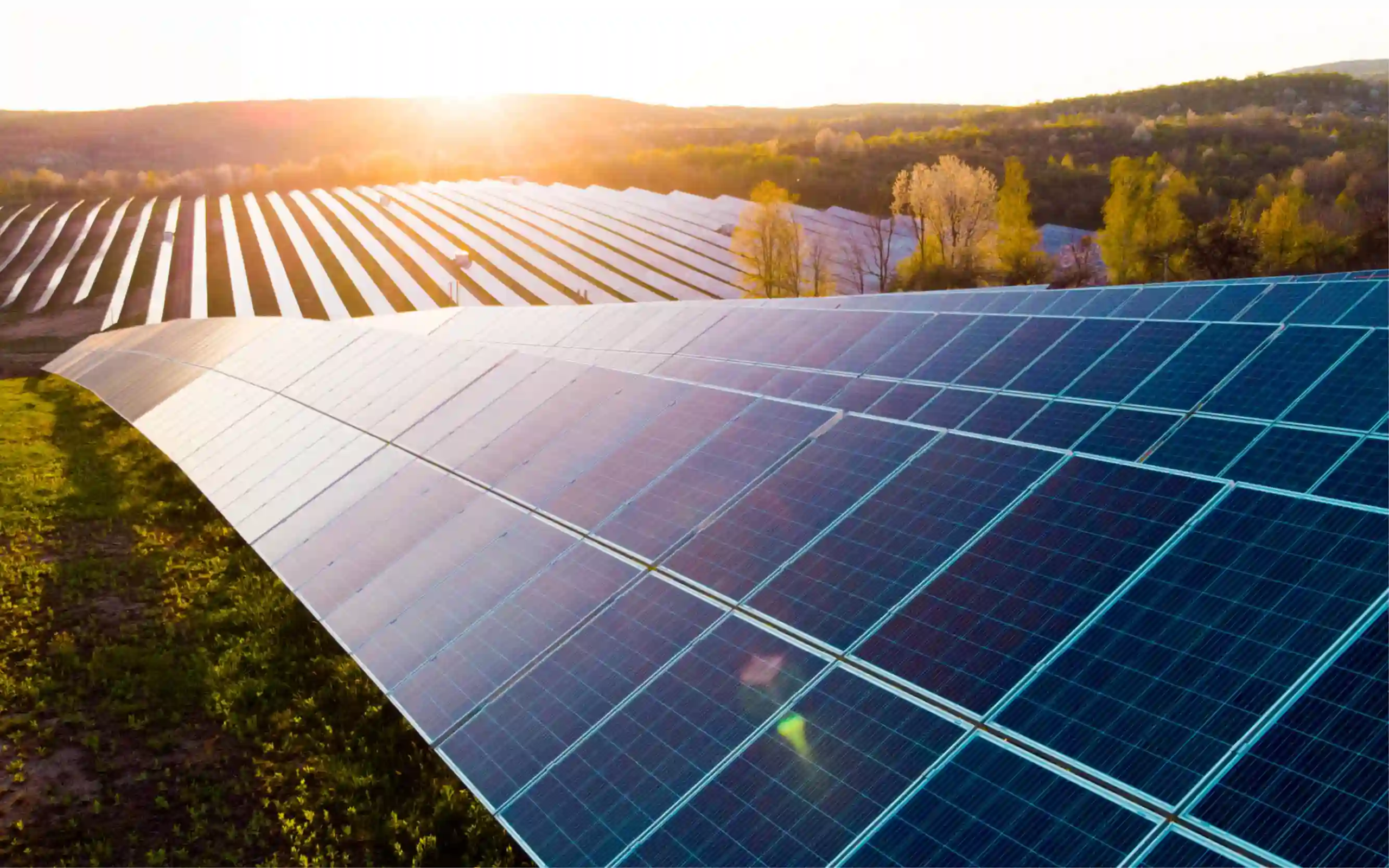 solar panels with a rising sun