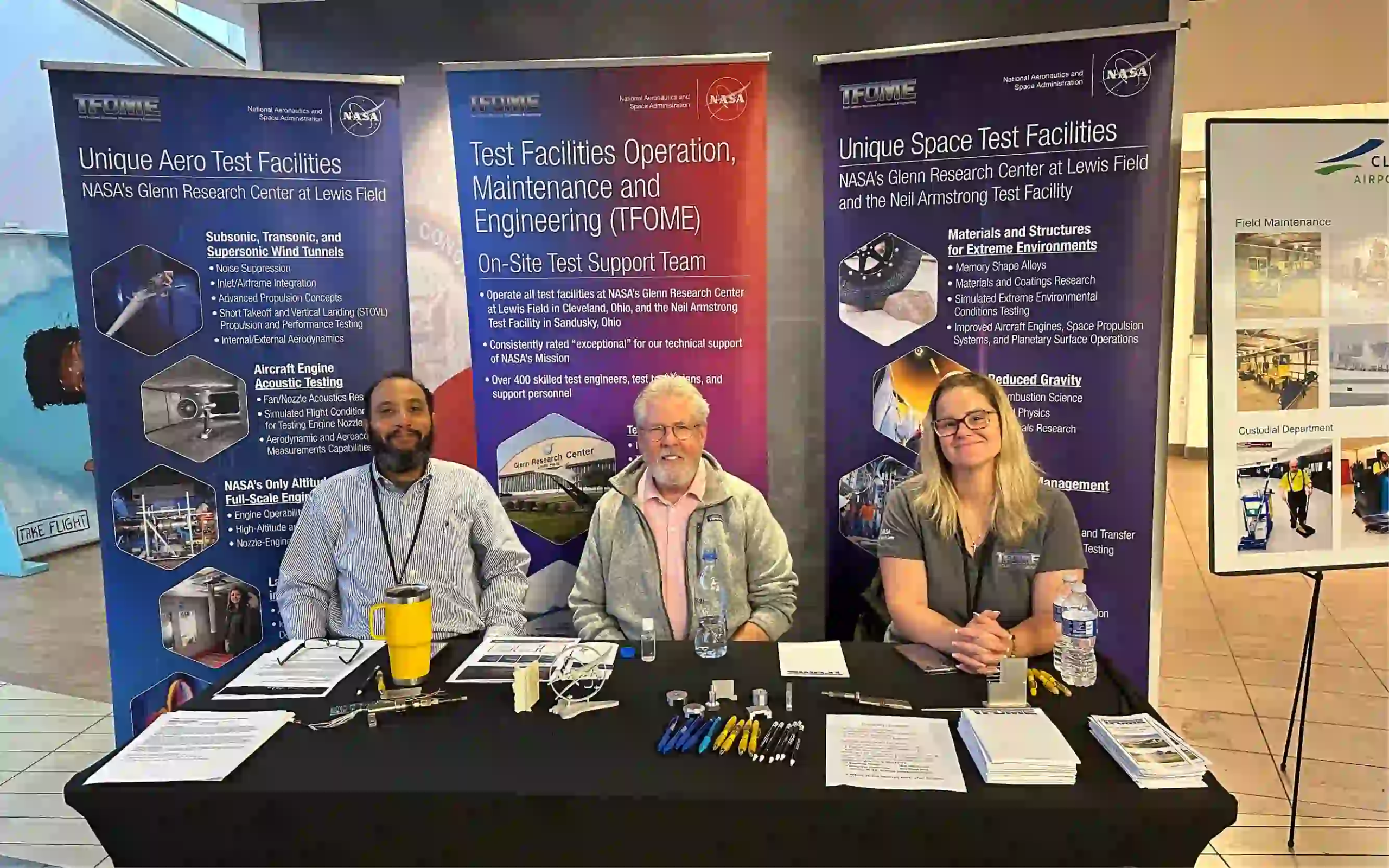 group photo of HX5 representatives at an exhibition table